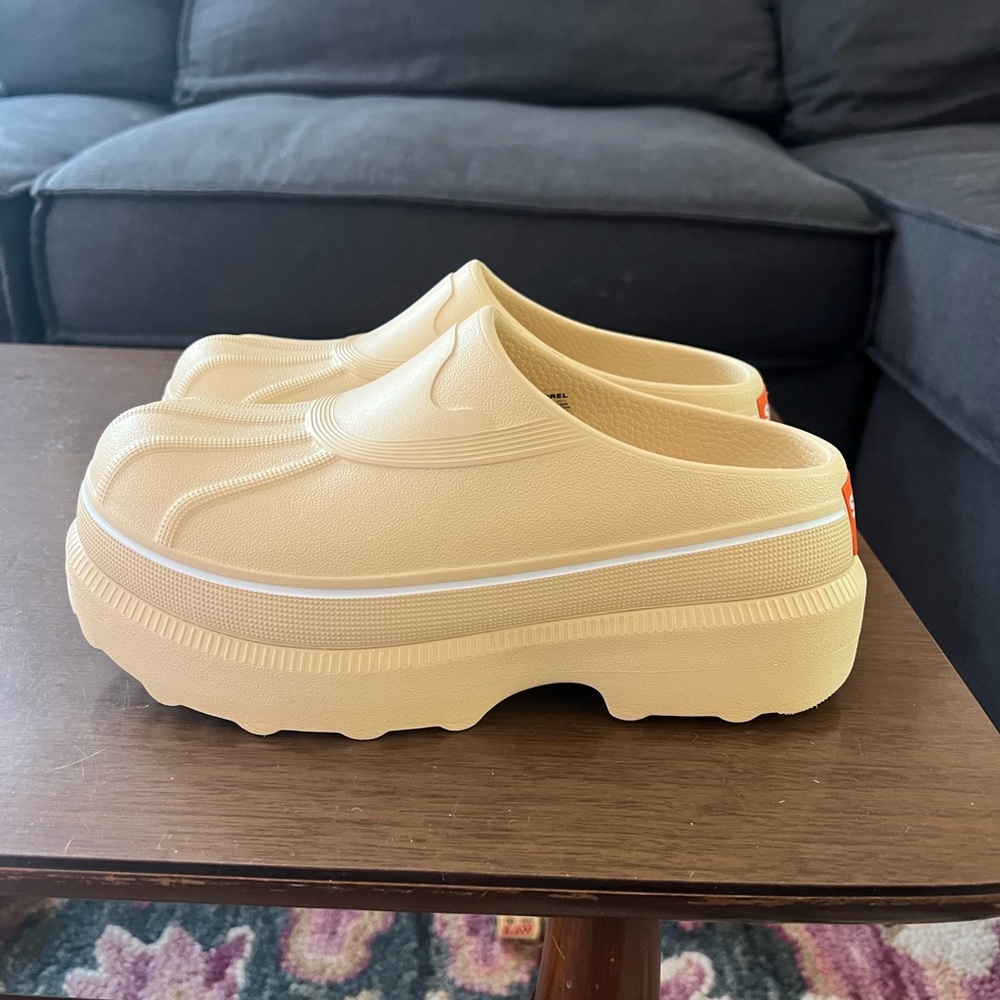 Beige Sorel Caribou Clogs